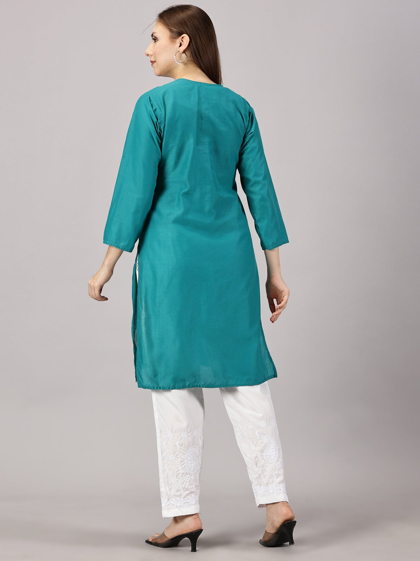 A-back-view-Here is the image of the Rama green cotton kurti. Let me know if there's anything else you'd like to adjust or add!