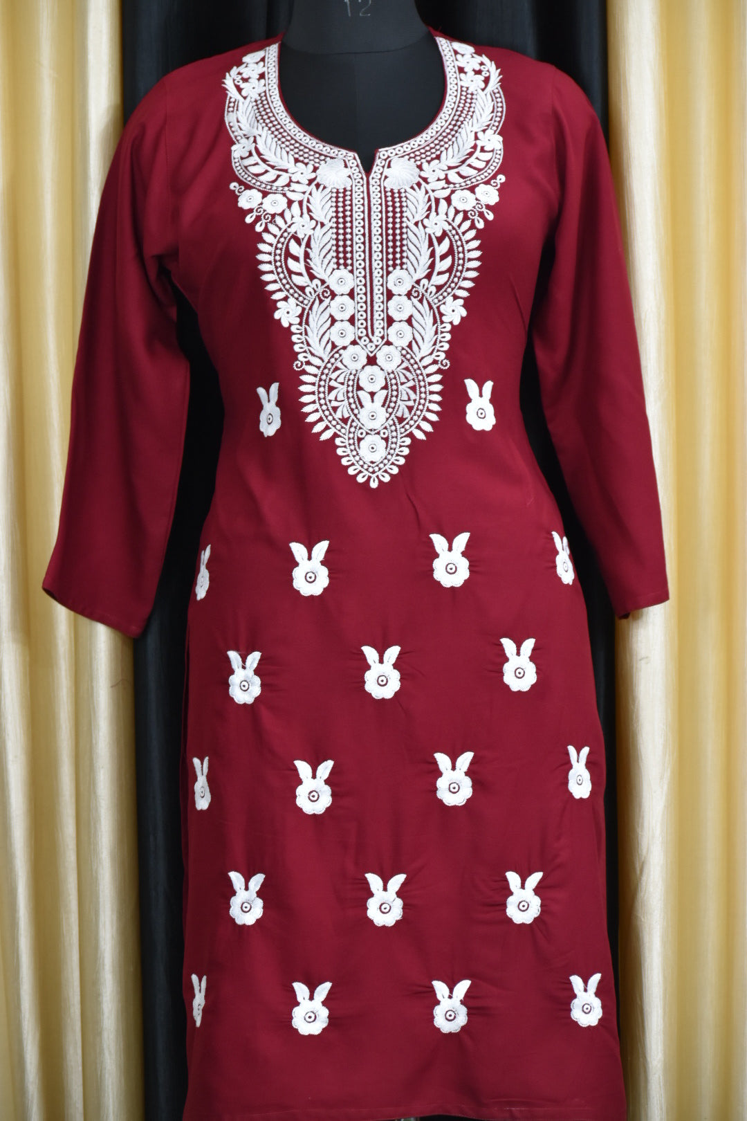 A-front-Beautiful maroon Cotton Chikankari Fabric Featuring Traditional Hand-Embroidered Designs
Let me know if you'd like more variations.
