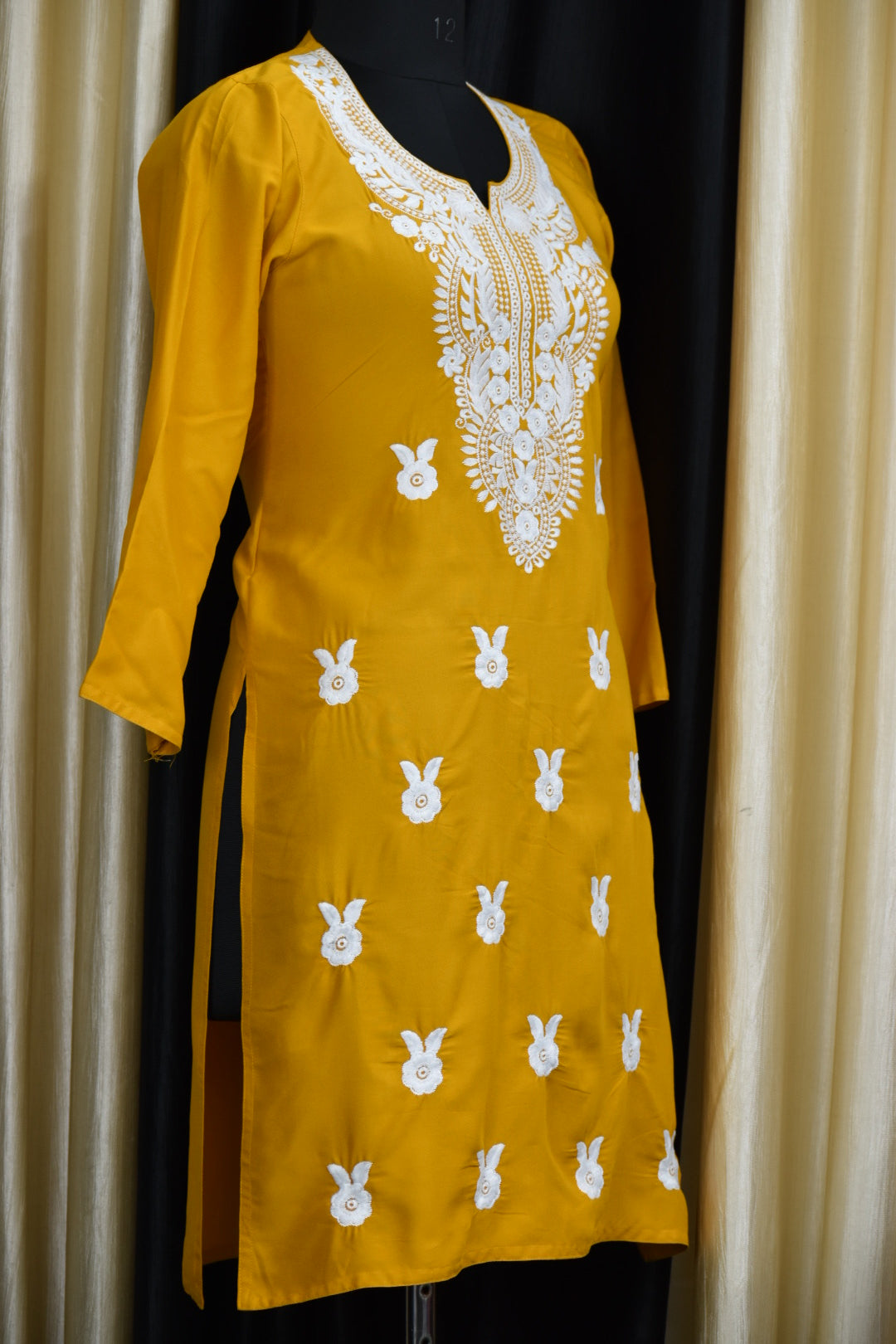 A-side-view-chikankari cotton yellow kurti