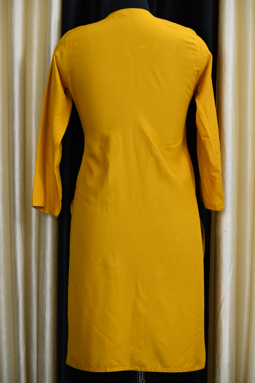 A-back-view-chikankari yellow cotton kurti