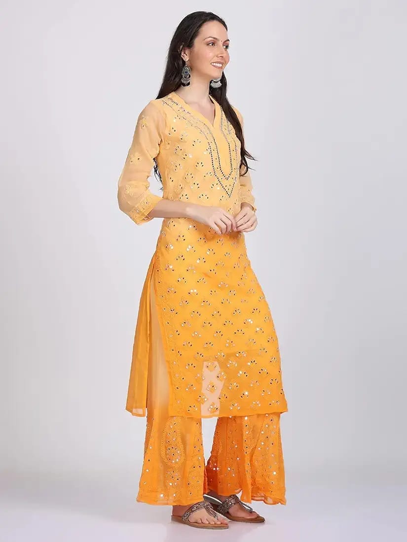A-fromt-view Orange Mirror Chikankari Kurti Set - Hand-embroidered with intricate mirror work, perfect for festive and casual occasions.